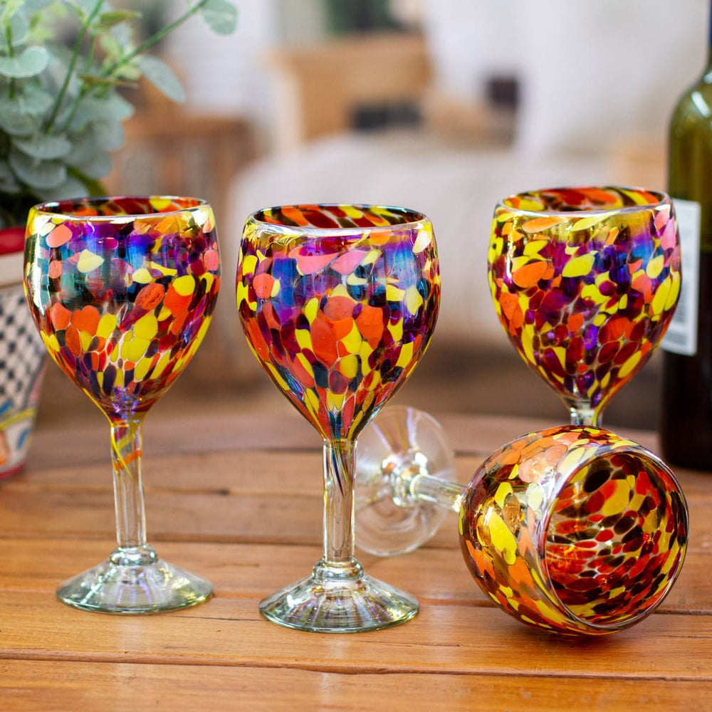 https://www.discovered.us/cdn/shop/files/novica-bright-confetti-handblown-recycled-glass-wine-glasses-4-handmade-discovered-781_1000x1000.jpg?v=1686223301