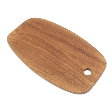 Novica Classic Oval Teak Wood Cutting Board - By Novica