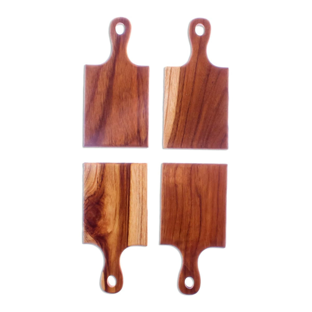 https://www.discovered.us/cdn/shop/files/novica-kitchen-mini-teak-wood-serving-boards-4-handmade-discovered-352_1000x1000.jpg?v=1686238335