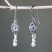 Earrings Clear quartz crystal in silver bezel setting with peanut on sterling hooks style - by Metal Studio Jewelry