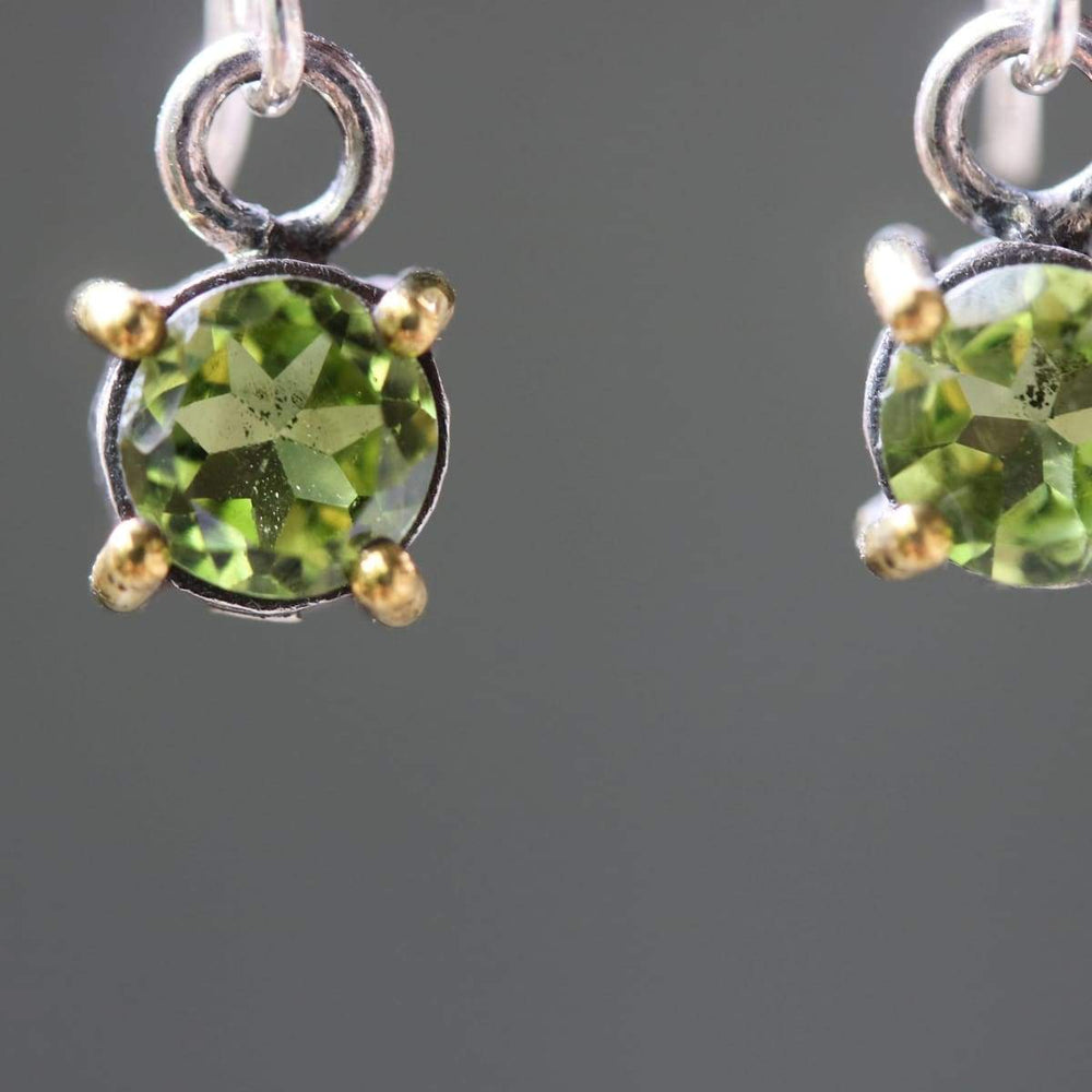 Earrings round faceted peridot in silver bezel and brass prongs setting with sterling hooks style