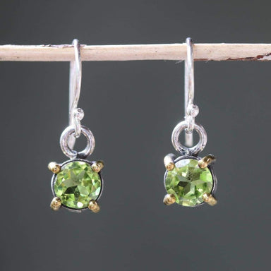 Earrings round faceted peridot in silver bezel and brass prongs setting with sterling hooks style