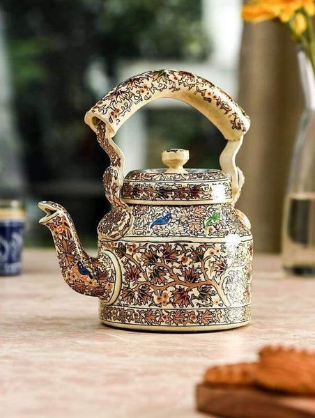 https://www.discovered.us/cdn/shop/products/kaushalam-hand-painted-tea-kettle-rajasthani-art-handmade-mrinalika-jain-discovered-443_grande.jpg?v=1610018581