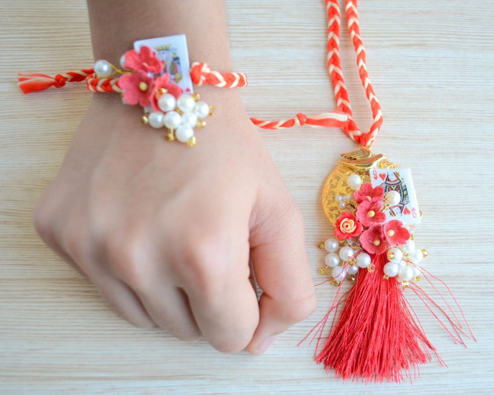 authentic white flower design bracelet Rakhi for bhabhi, sister | Buy  Online Bracelet Rakhi