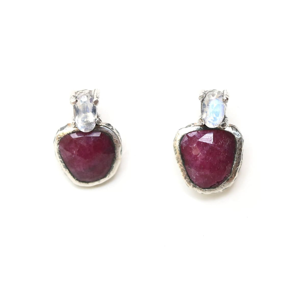 Ruby and tiny oval feacted moonstone stud earrings in silver bezel prongs setting with sterling post backing - by Metal Studio Jewelry