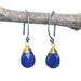 Teardrop faceted lapis lazuli earrings with brass wire wrapped and oxidized sterling silver hooks style - by Metal Studio Jewelry