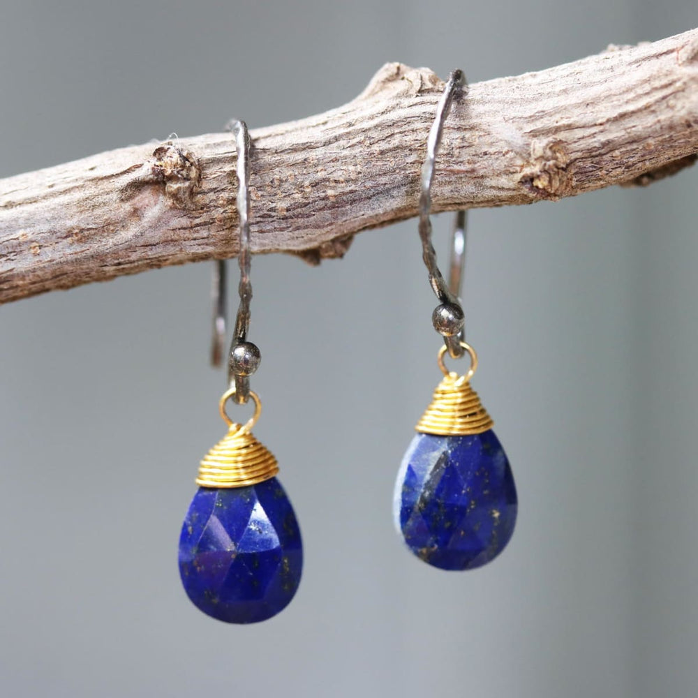 Teardrop faceted lapis lazuli earrings with brass wire wrapped and oxidized sterling silver hooks style - by Metal Studio Jewelry